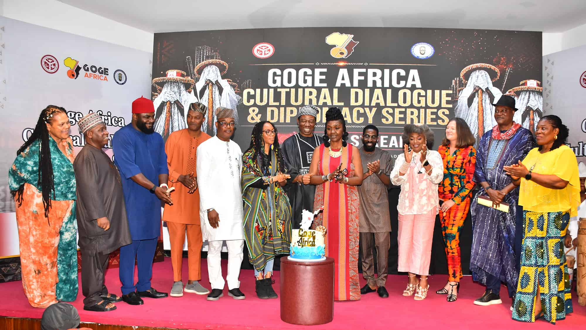 Official group photograph — all attendees, diplomats, panelists, dignitaries
